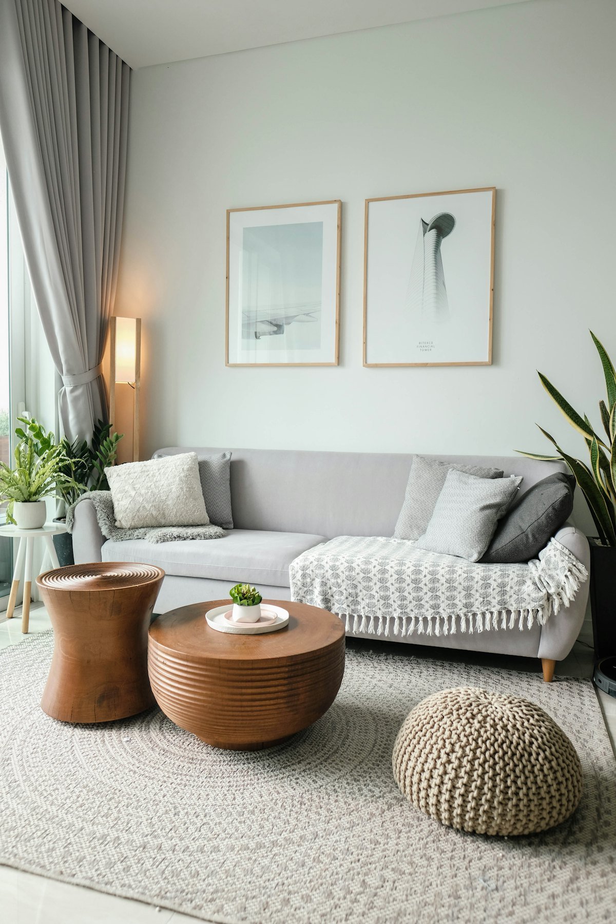 Living room with wooden coffee tables and soft furnishing