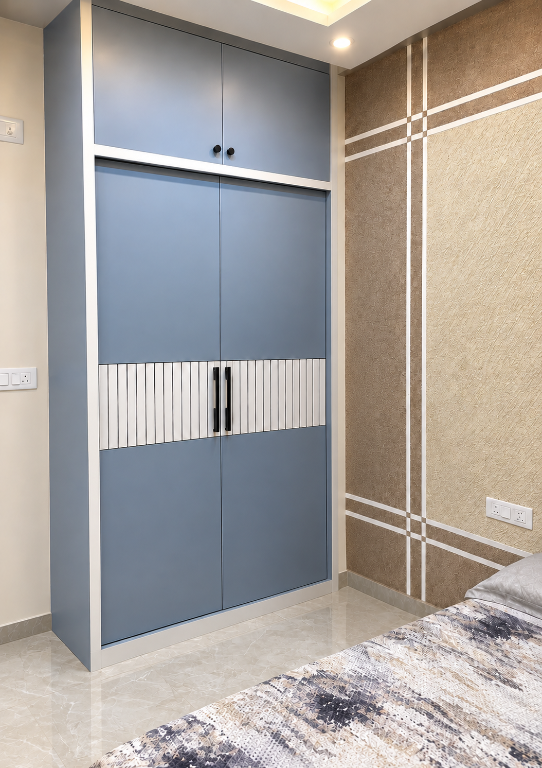 Pradeep Kumar, owner of Shree Maruthi Furnitures, beside a wardrobe he built