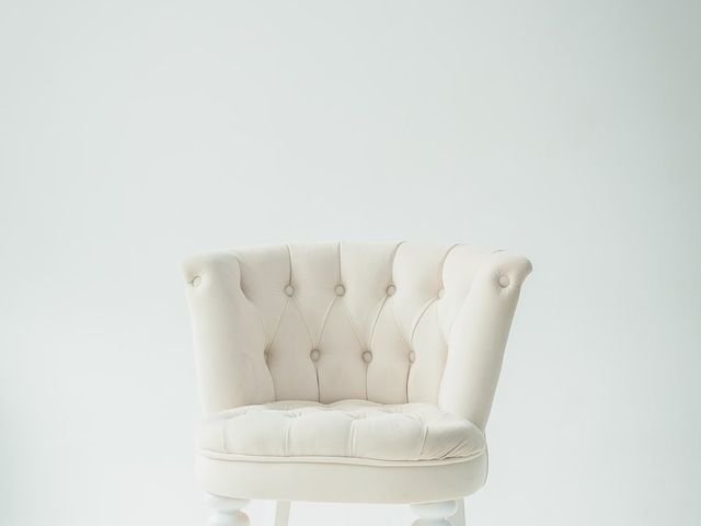 Cream tufted accent chair
