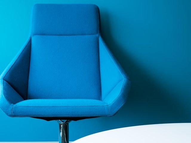 Blue upholstered swivel office chair