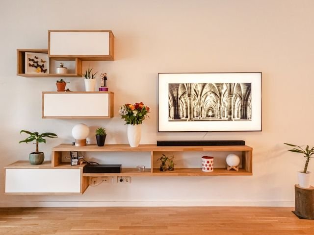 Wall mounted wooden TV console with floating shelves