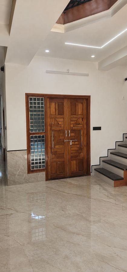 Solid teak main double door with carved panels